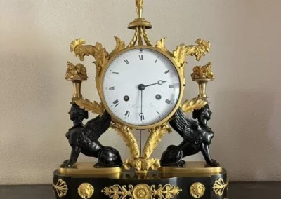 Réparation horloge cartel dorée
