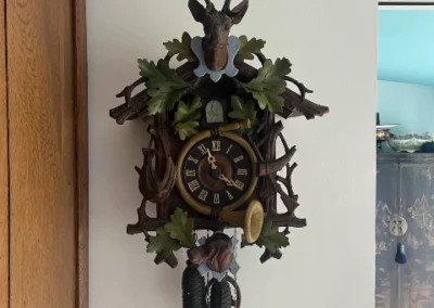 Réparation horloge coucou bois